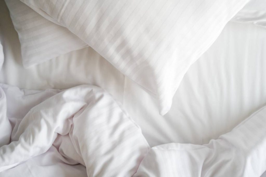 Linge de lit en laine mérinos favorisant la thermorégulation et le confort nocturne